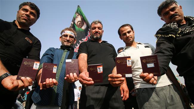 Millions of pilgrims cross Iran into Iraq for mourning