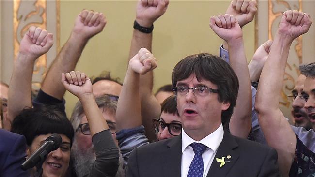 Puigdemont, deputies turn selves in to Belgian police