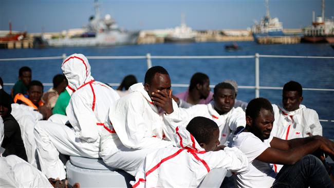 At least 5 dead after refugee boat sinks off Libya