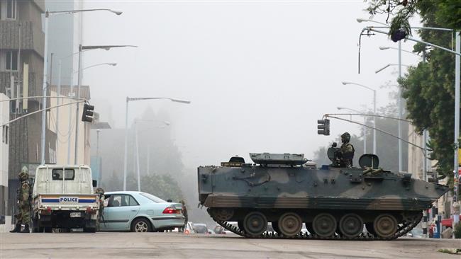 Zimbabwe in ‘bloodless transition’ away from Mugabe