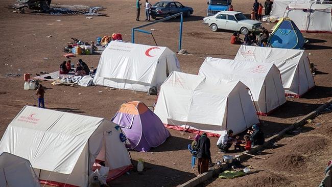 Iran quake survivors greet donors with “Thank You”