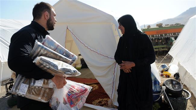 Iranian wrestlers rush to aid earthquake victims
