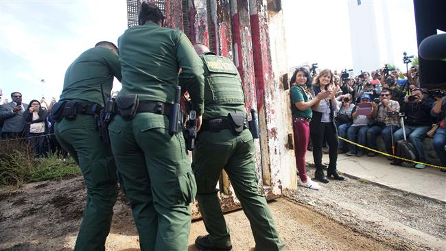 Trump says ‘will, must’ build border wall
