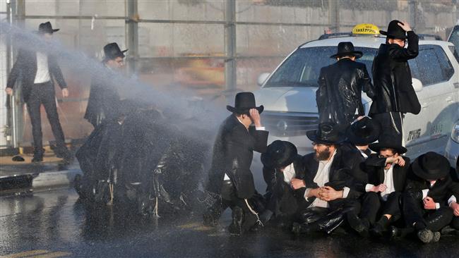 Israeli forces clash with draft protesters