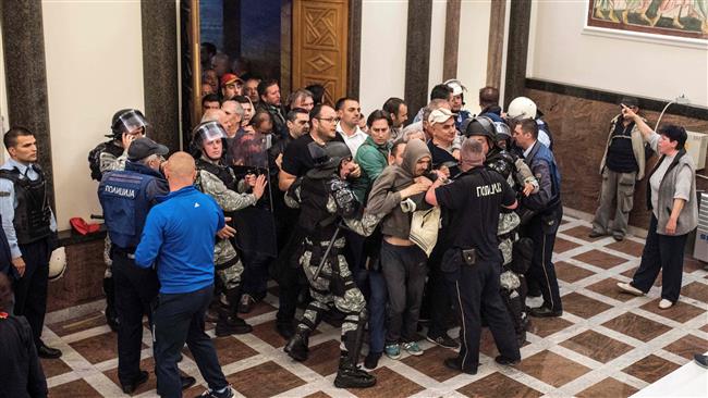 Macedonia nabs 30 over parliament attack