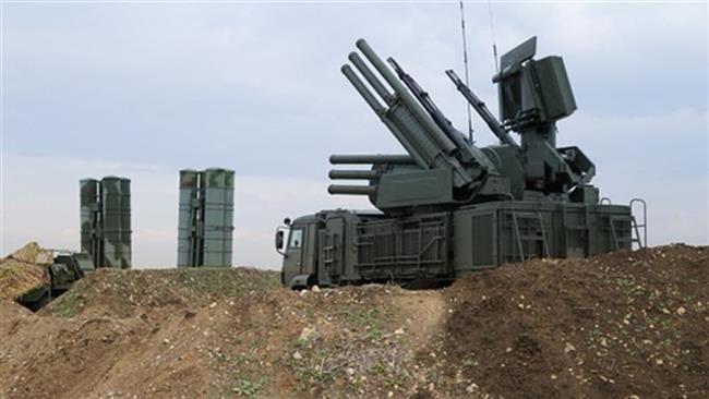 Syria's military intercepts Israeli missiles