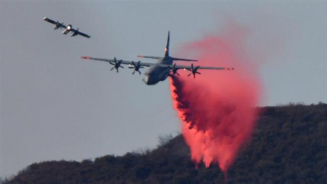 Firefighters race to contain California wildfires