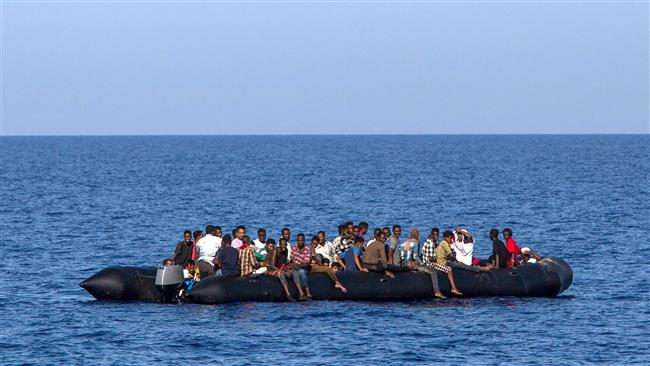 Nearly 900 refugees rescued off Libya arrive in Italy