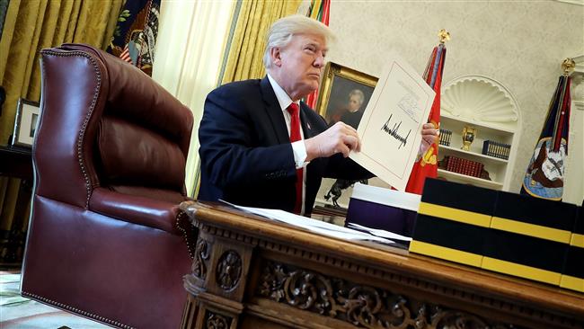Trump signs GOP tax plan to reward the rich