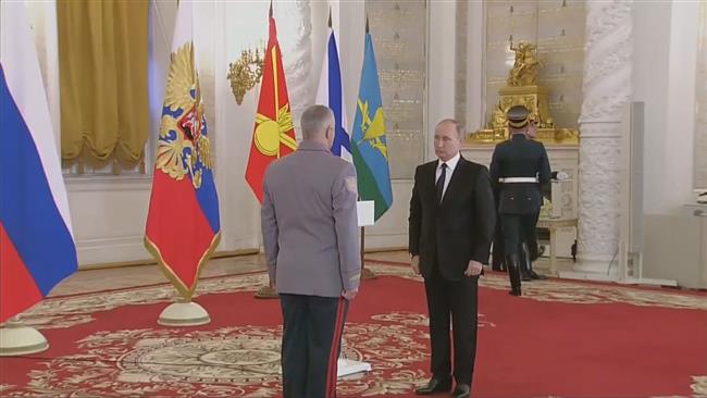 Putin honors troops returning from terror fight in Syria