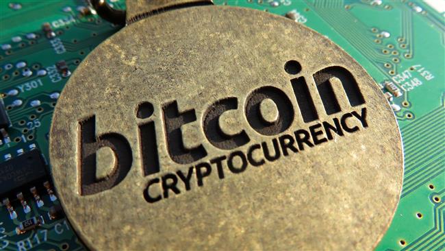 Iran’s top banker warns against trading in bitcoin 