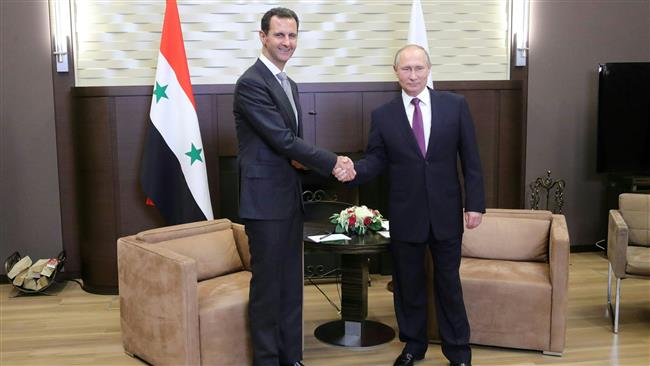 Putin says Russia will continue to defend Syria