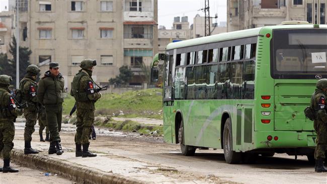 Militants surrender in southwest Syria