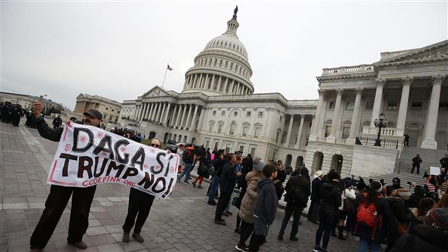 US judge blocks Trump decision to scrap DACA 