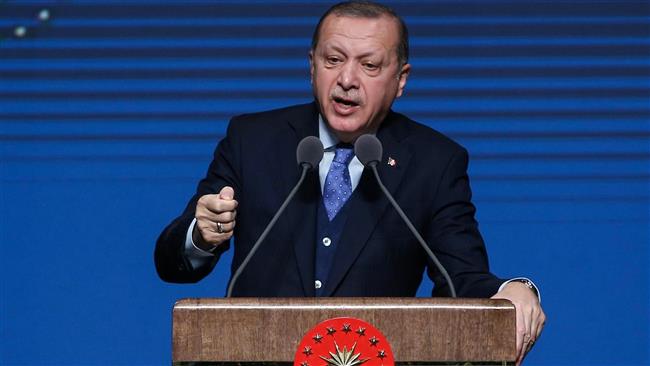 Turkey says will foil border 'games' amid Syria offensive
