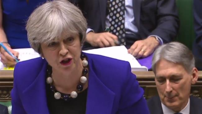 EU outlines Brexit position as pressure builds on British PM 