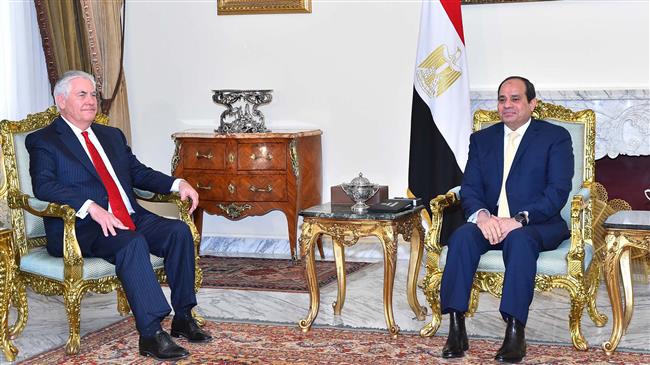 In Egypt, Tillerson keeps silent on pre-election crackdown