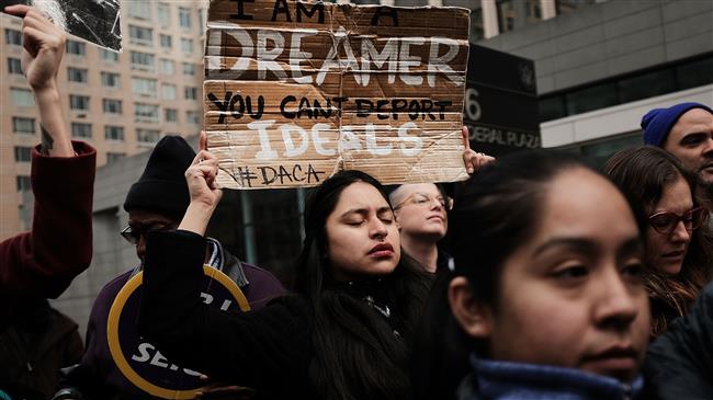 US federal judge blocks Trump decision on DACA 