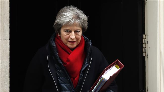 UK PM May wants EU citizens to stay after Brexit