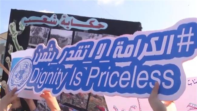 UNRWA employees protest against Trump funding cut