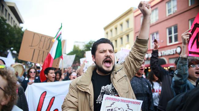 Trump faces massive protests on first visit to California