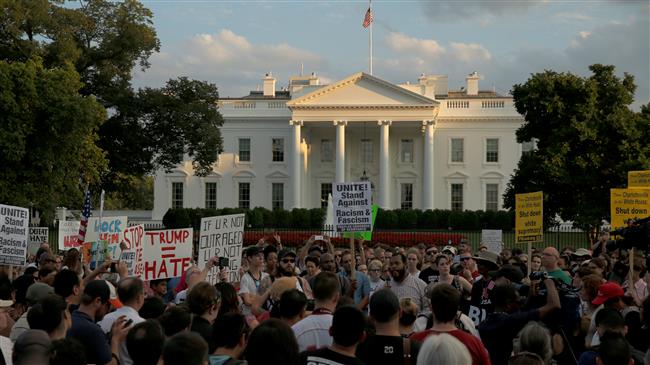 Protesters slam Trump: 'Gangster in White House'