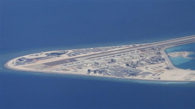 US warns China of 'consequences' of military buildup 