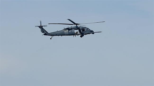 US military helicopter drops ammunition on school