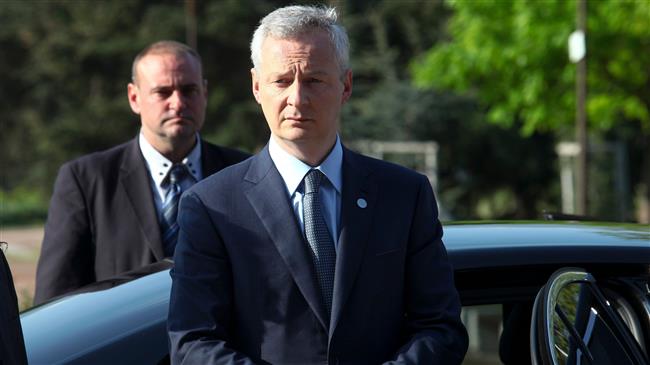 France urges Italy to keep EU commitments