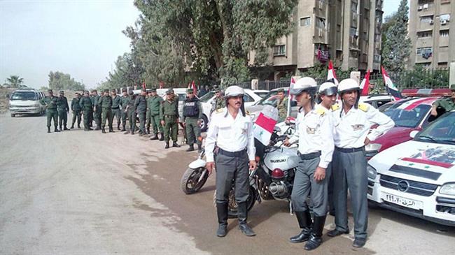 Syrian police deploy forces in south Damascus areas