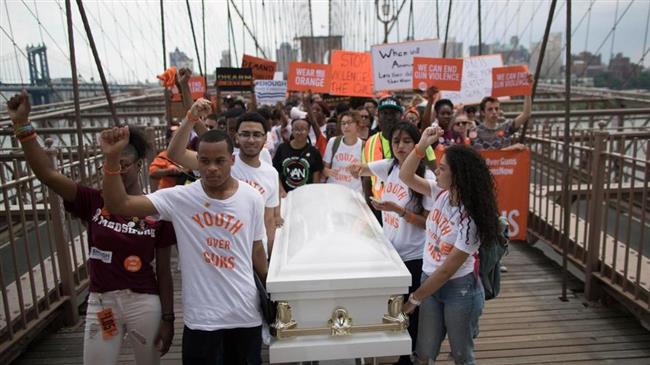 Thousands march across US to protest gun violence