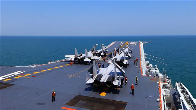 Beijing conducts missile drills in contested South China Sea