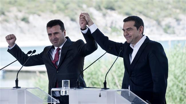 Greece, Macedonia sign deal, face opposition still