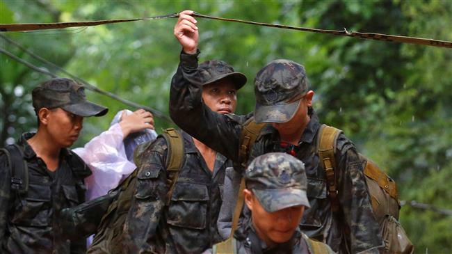 Search continues for minors, coach trapped in Thai cave