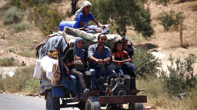 Displaced Syrians returning home after Dara'a deal