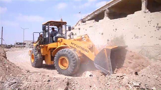 In Syria's Dara'a, roads reopen after retaking of city