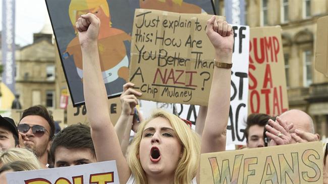 Trump greeted by protests in Scotland 