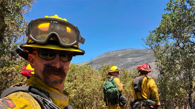 Death toll from California fires rises to 10