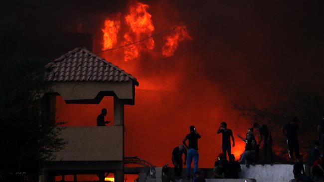 Buildings torched as deadly unrest rages on in Iraq's Basra