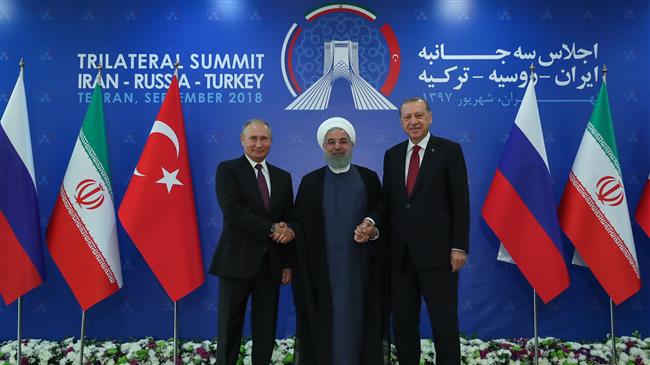 At Tehran summit, Rouhani calls for US pullout from Syria