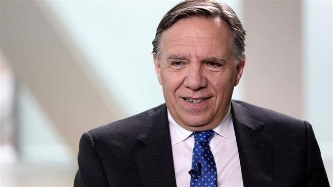 New Quebec premier to ban hijab amid protests 