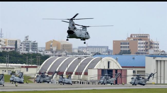 Japan's Okinawa decides to vote on relocating US base