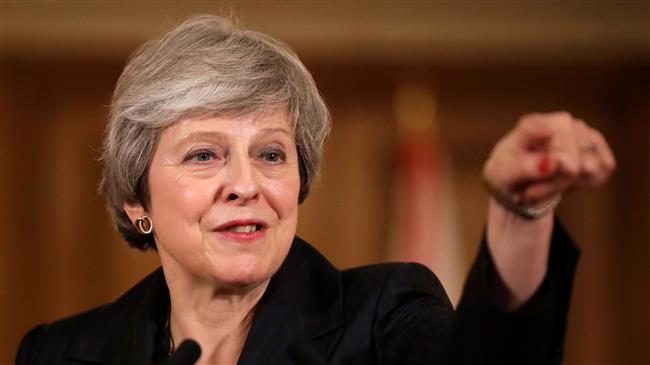 UK PM May vows to fight for draft Brexit deal