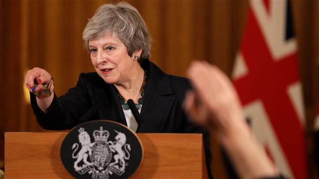 British PM defends Brexit deal amid mounting criticism 