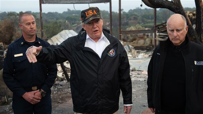 Trump says his view on climate change not changed 