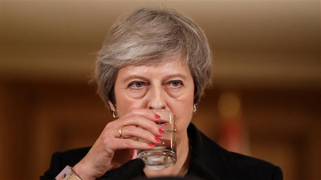 May remains defiant in face of calls to resign