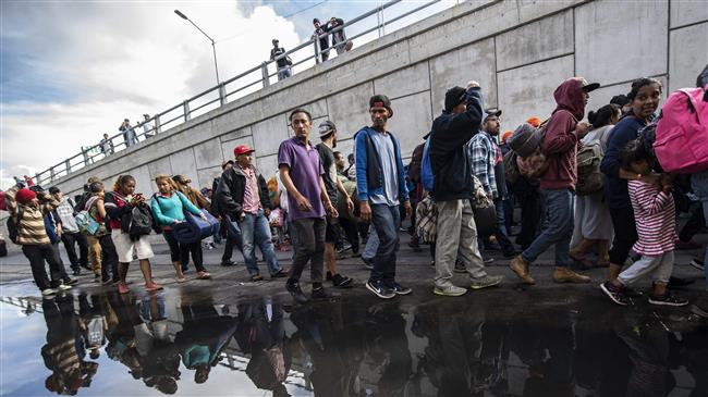 Tensions rise at US-Mexico border as migrants arrive