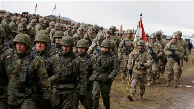 'NATO builds up troops near Russia under guise of drills'