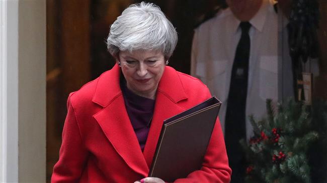 UK PM defiant in face of resignation calls