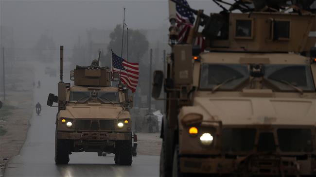 Trump defends withdrawing US troops from Syria
